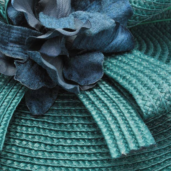 Style Bernice. Teal woven fascinator