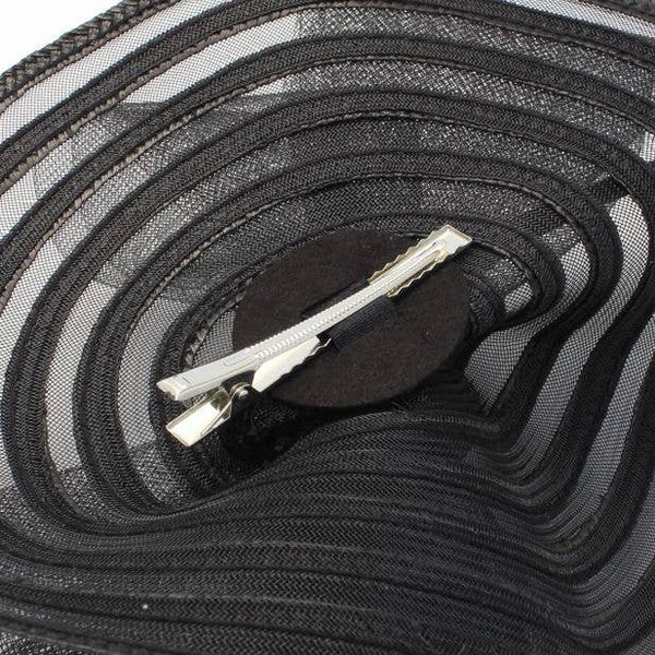 Style Iris. Black Swirl Net Fascinator With Ostrich Quill
