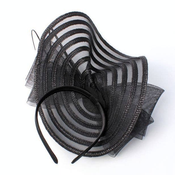 Style Iris. Black Swirl Net Fascinator With Ostrich Quill