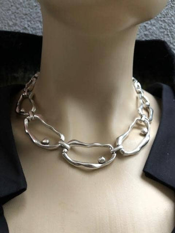 2R04 organic, sculptural style, silver plated necklace.