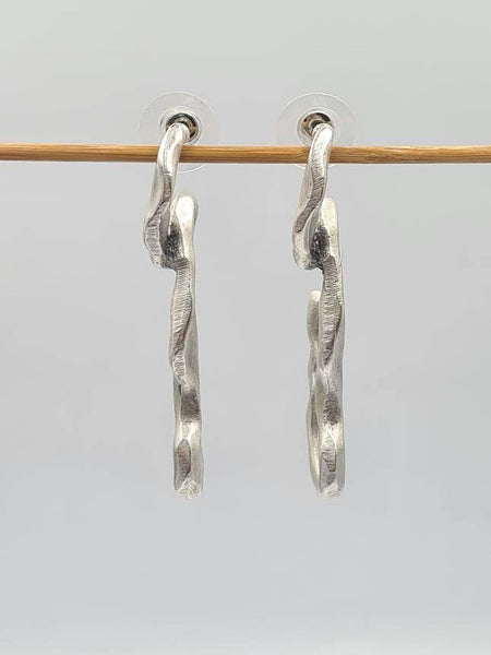 Echo texture earrings, silver plated