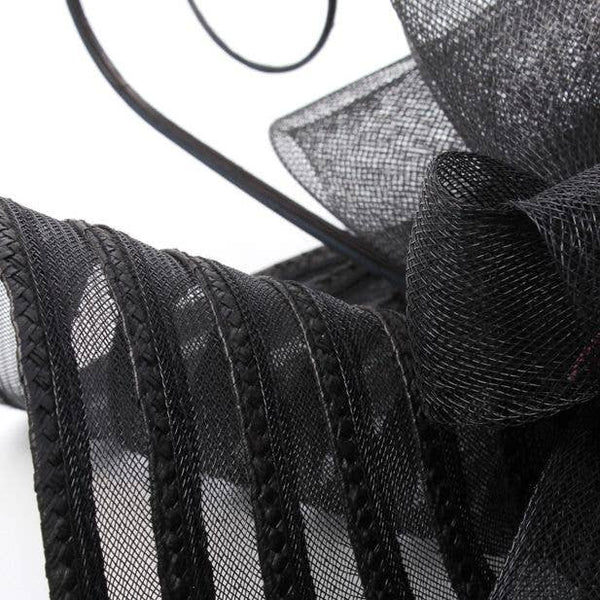 Style Iris. Black Swirl Net Fascinator With Ostrich Quill